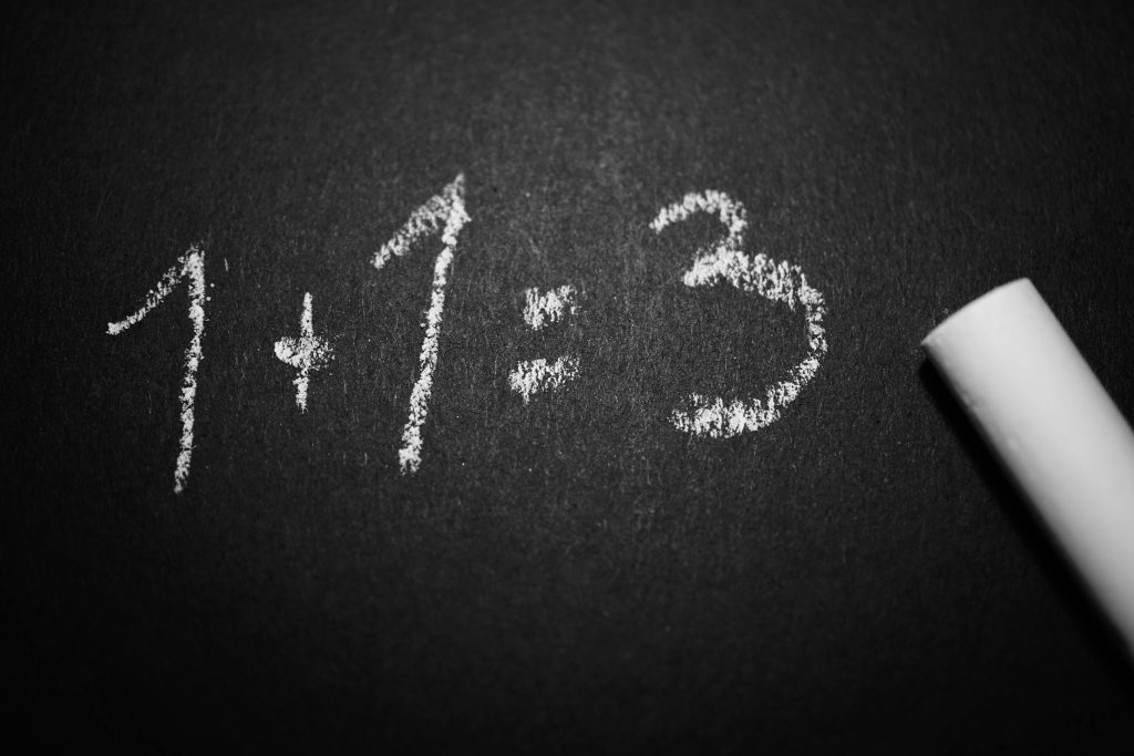 pexels-photo-374918-374918 1 + 1 = 3 Text on Black Chalkboard