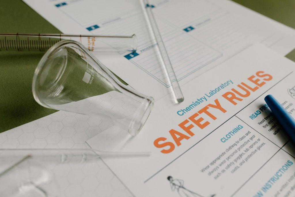 Clear Drinking Glass on White Printer Paper
